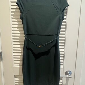 Emerald green suiting dress
